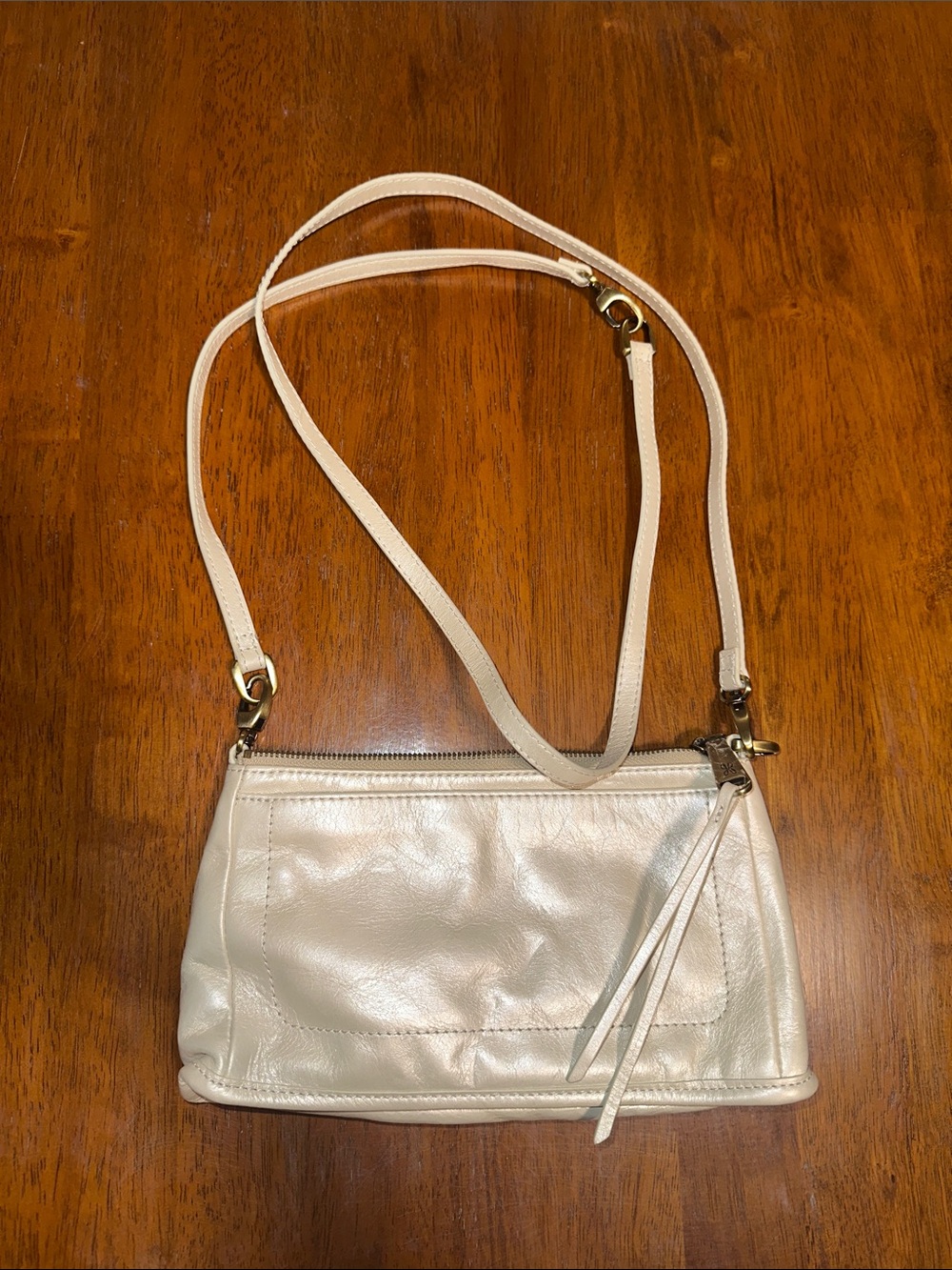 HOBO Cream Leather Crossbody with Zip and Tassel